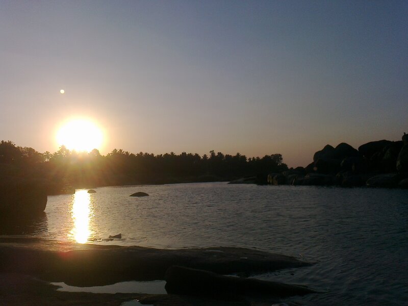 Sun Setting over River — Blue