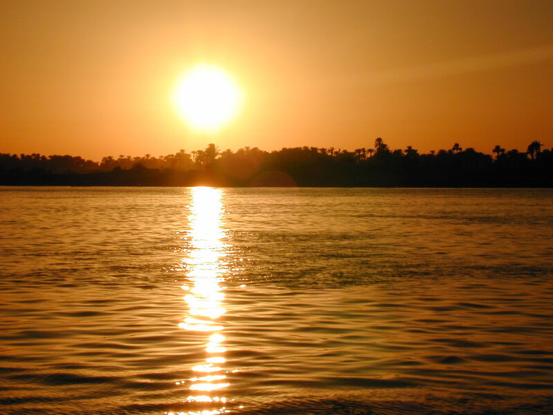 Sun Setting over River — Orange