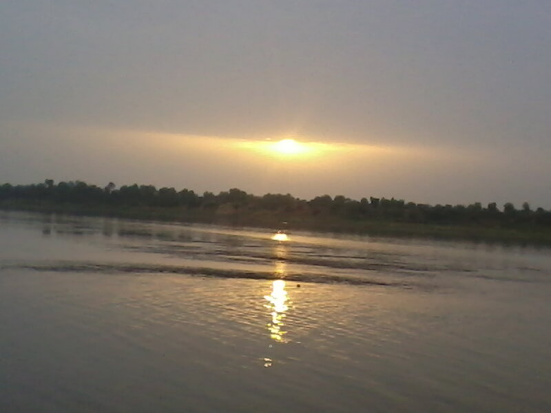 Sun Setting over River — Yellow