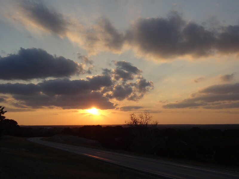 Sun Setting over Road — Orange