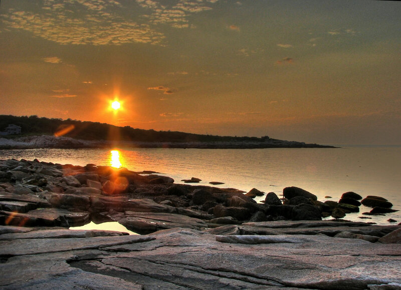 Sun Setting over Rocky Shore