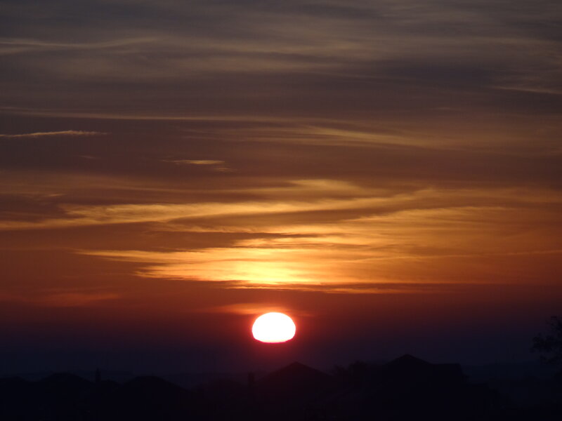 Sun Setting over Rooftops
