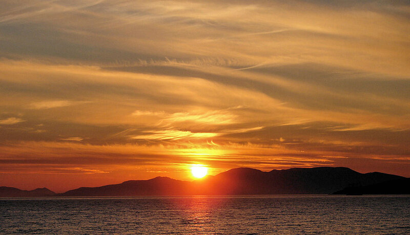 Sun Setting over Sea — Orange, Serene, Sunset, Photograph, Mountains