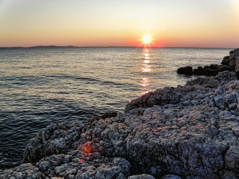 Sun Setting over Sea — Orange