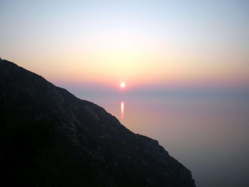 Sun Setting over Sea — Pink