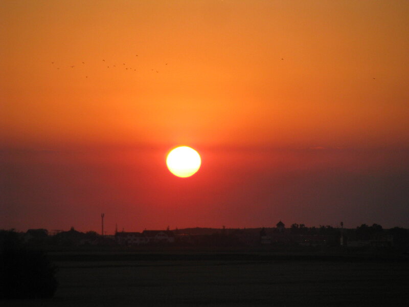Sun Setting over Town