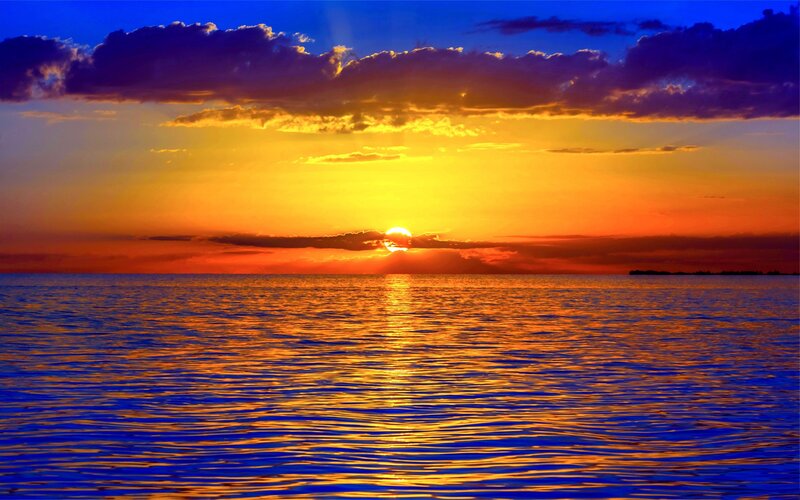 Sun Setting over Water — Blue, Dramatic, Sunset, Photograph, Clouds