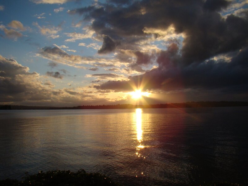 Sun Setting over Water — Blue, Dramatic, Sunset, Photograph