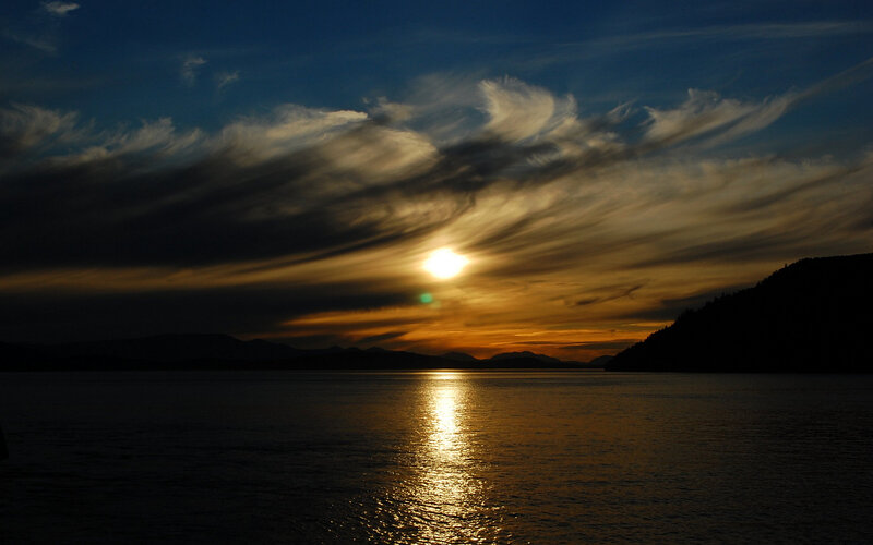 Sun Setting over Water — Blue, Dramatic