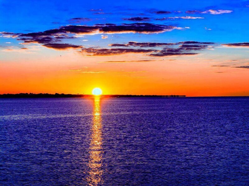Sun Setting over Water — Blue, Serene, Sunset, Photograph, Sky