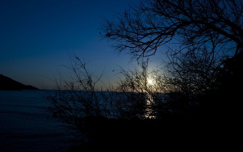 Sun Setting over Water — Blue, Serene, Sunset, Photograph