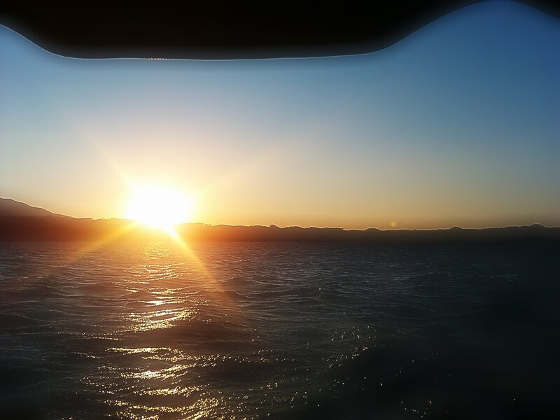 Sun Setting over Water — Blue, Serene