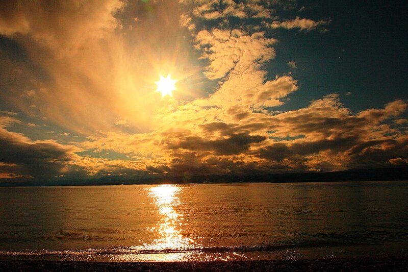 Sun Setting over Water — Gold, Dramatic