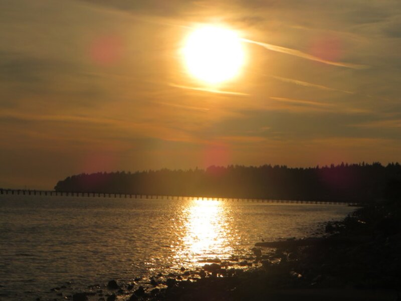 Sun Setting over Water — Gold, Serene, Sunset