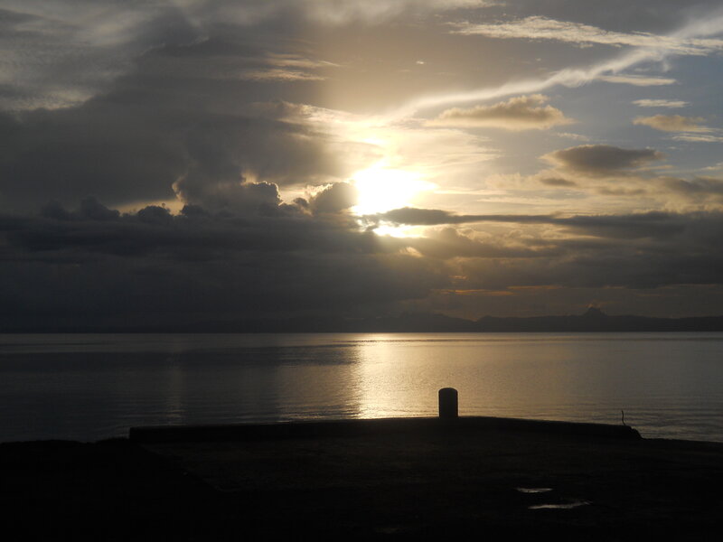 Sun Setting over Water — Gray