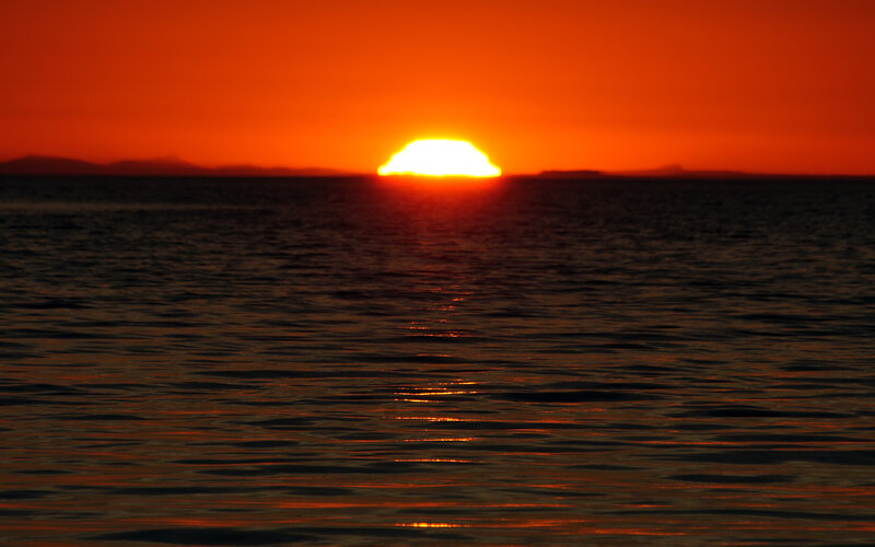 Sun Setting over Water — Orange, Dramatic, Sunset, Photograph, Sea