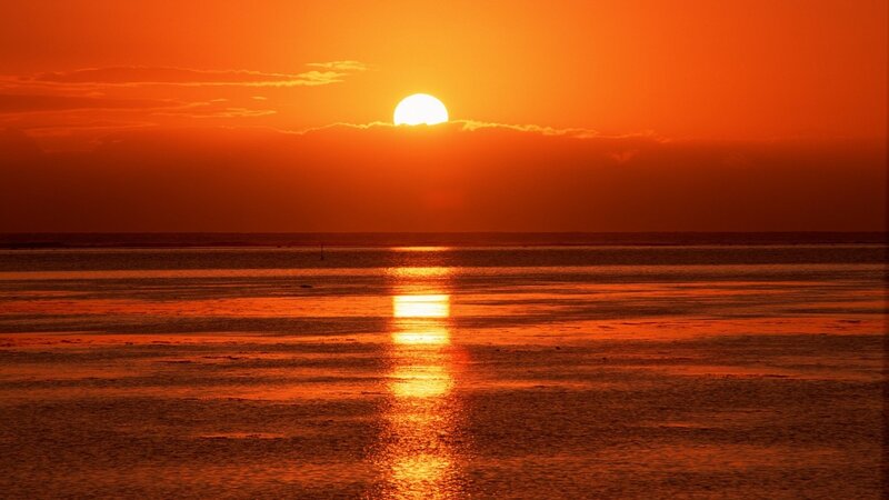 Sun Setting over Water — Orange, Serene, Sunset, Photograph, Clouds, Reflection, Red