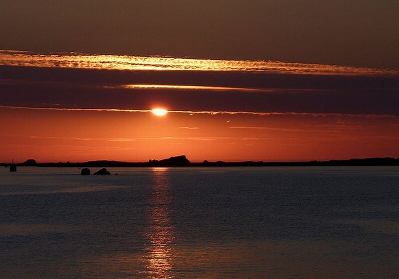 Sun Setting over Water — Orange, Serene, Sunset, Photograph, Clouds, Silhouette