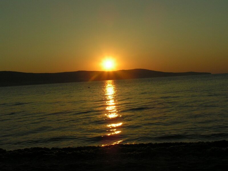 Sun Setting over Water — Orange, Serene, Sunset, Photograph, Mountain