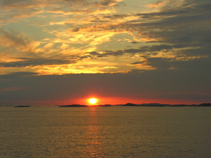 Sun Setting over Water — Orange, Serene, Sunset, Photograph, Sky, Clouds, Islands