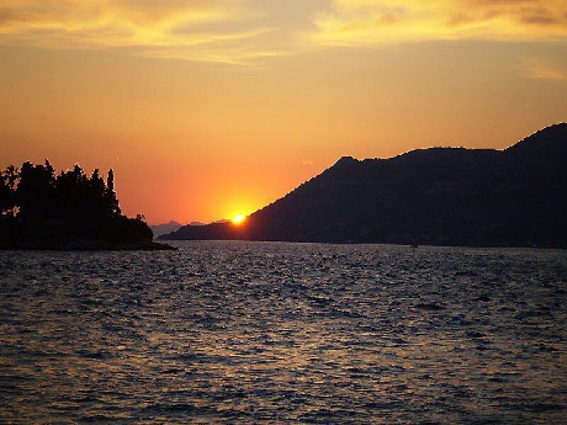 Sun Setting over Water — Orange