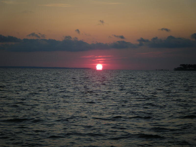 Sun Setting over Water — Pink, Calm