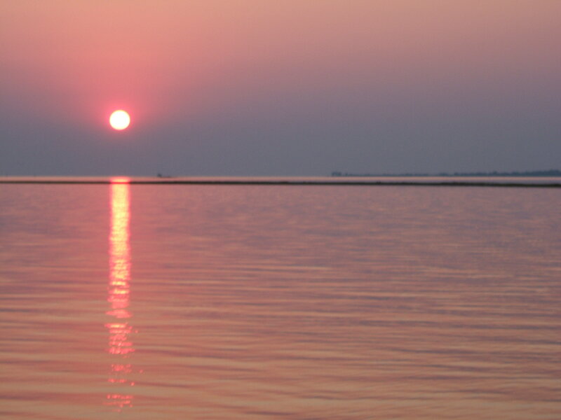 Sun Setting over Water — Pink