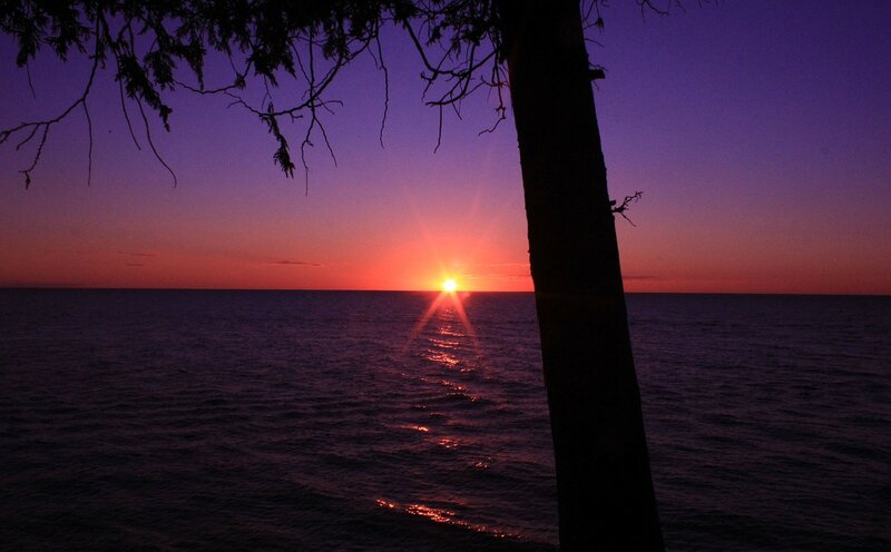 Sun Setting over Water — Purple, Serene