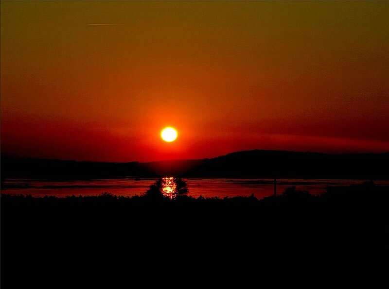 Sun Setting over Water — Red, Dramatic, Sunset, Photograph, Mountain, River