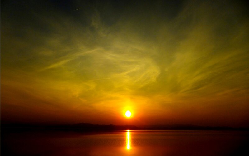Sun Setting over Water — Yellow, Dramatic