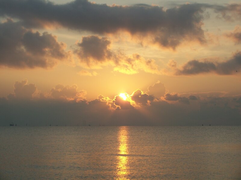 Sun Setting over Water — Yellow, Serene