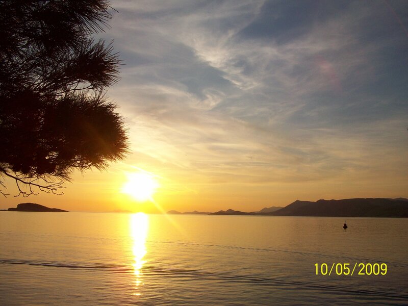Sun Setting over Water — Yellow
