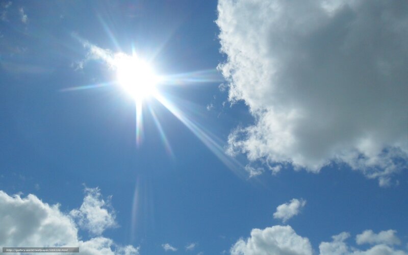Sun shining in blue sky