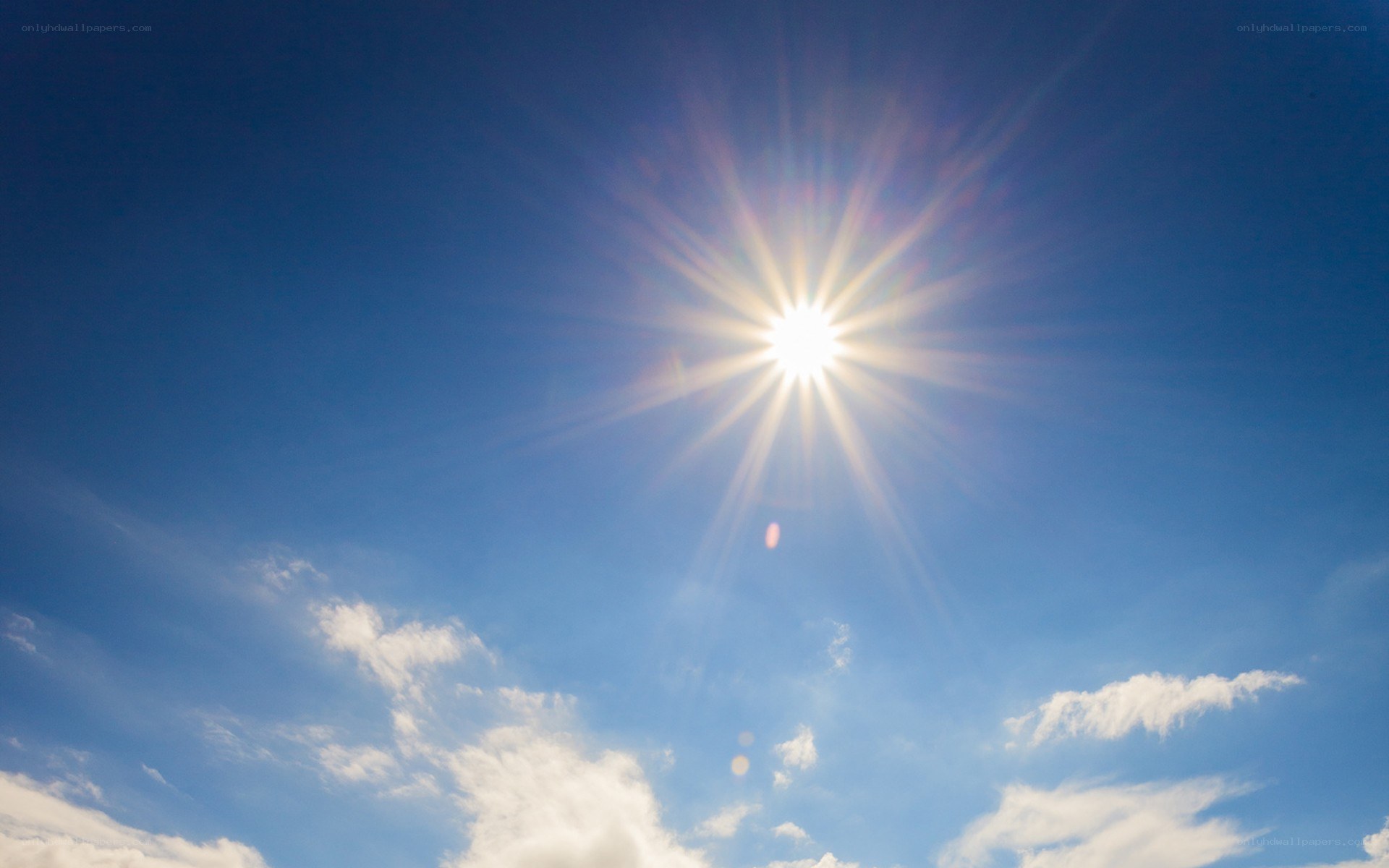 Sun shining in blue sky