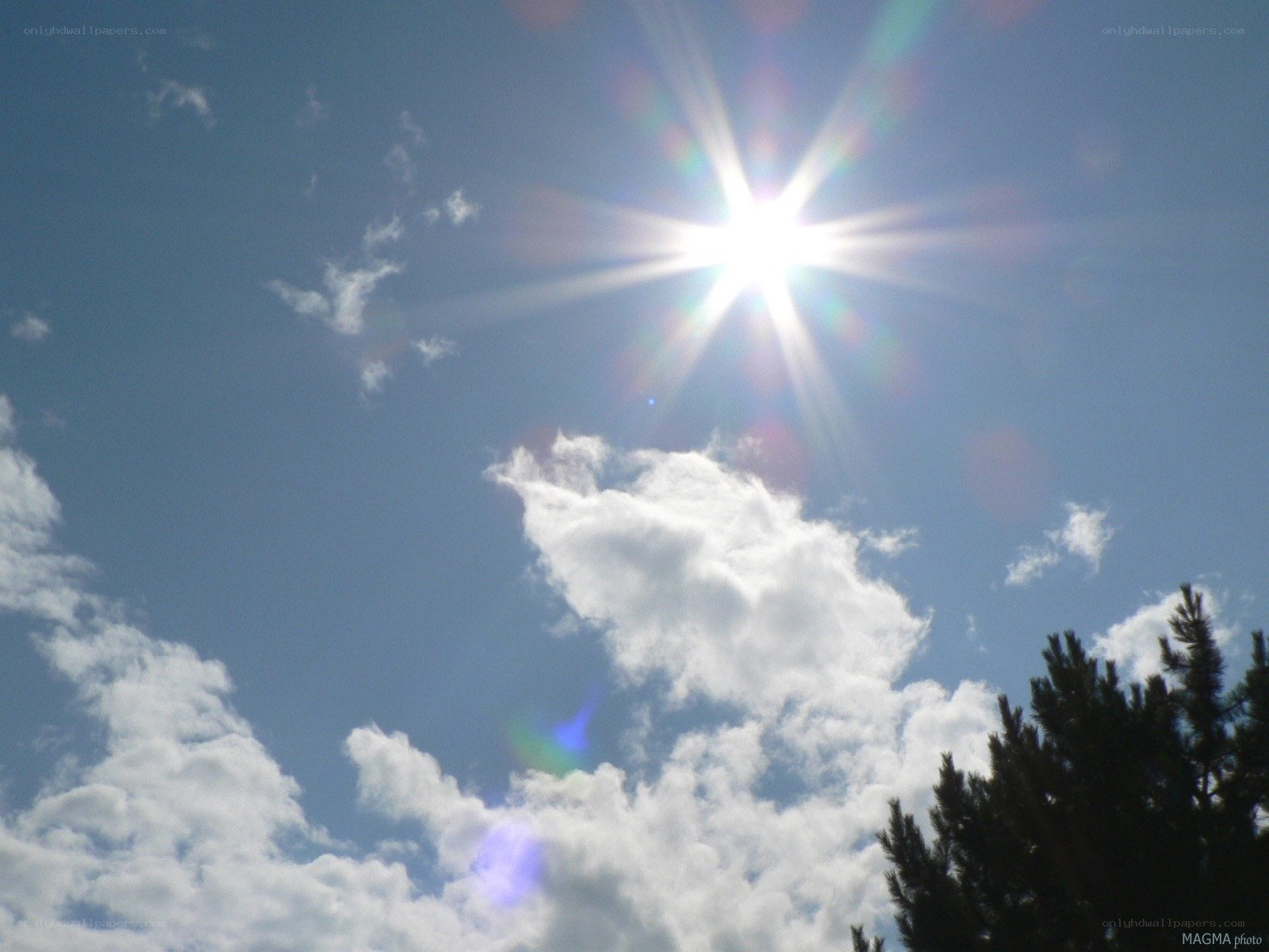 Sun shining in blue sky