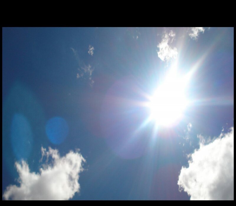 Sun shining in blue sky