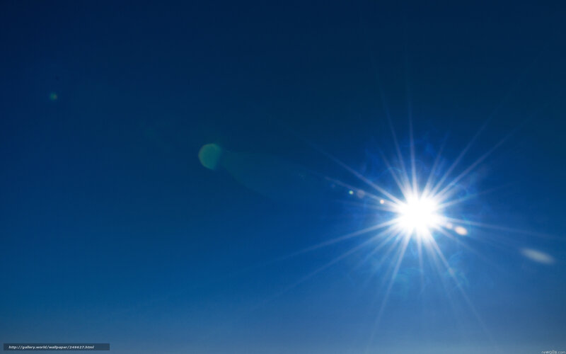 Sun shining in blue sky