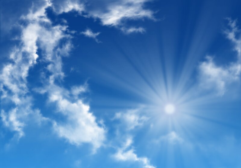 Sun shining through clouds