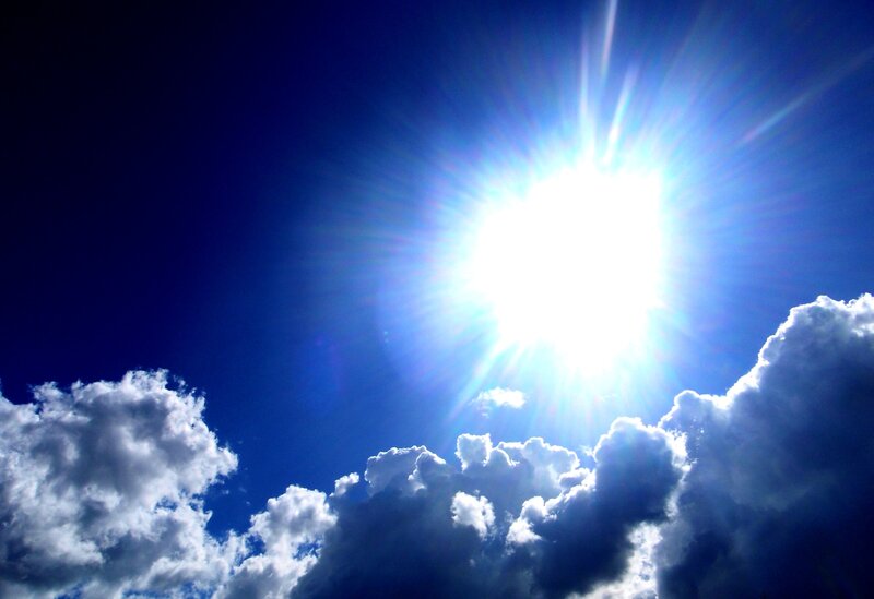 Sun shining through clouds