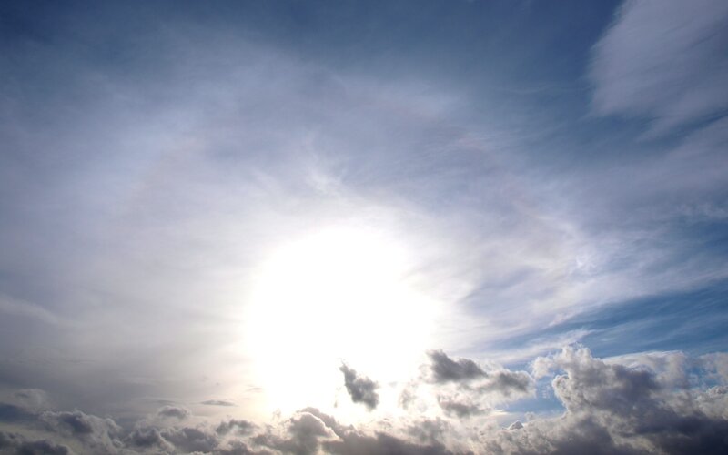 Sun shining through clouds