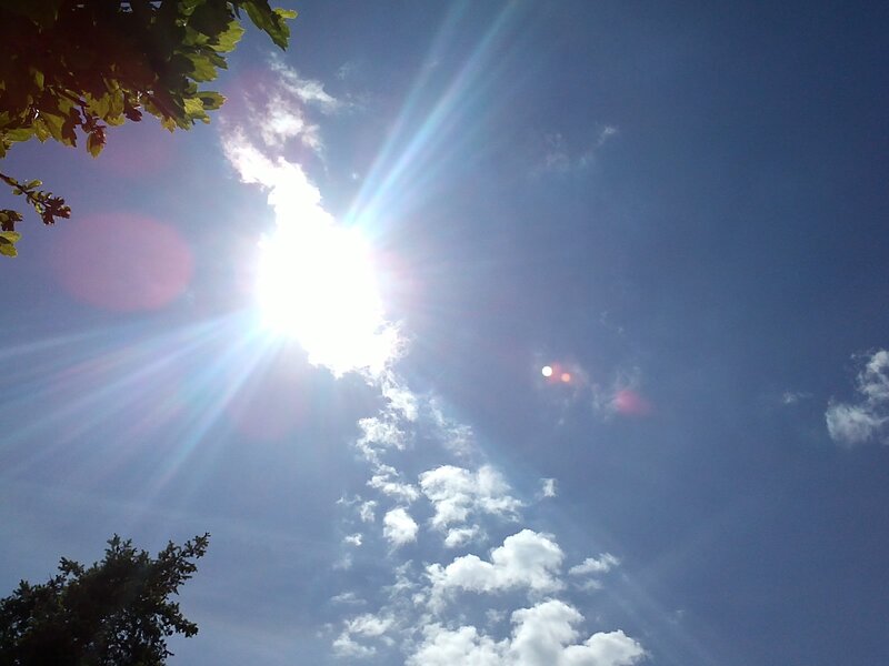 Sun shining through clouds