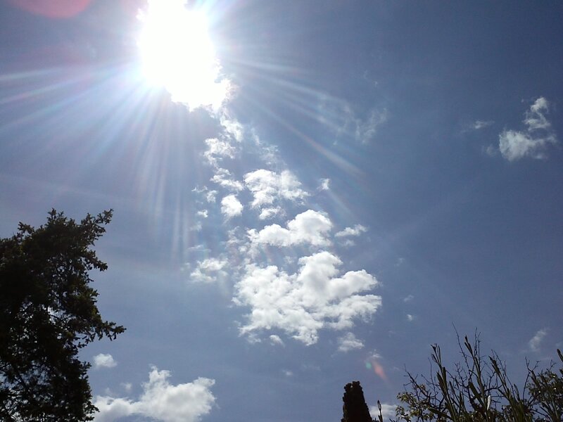 Sun shining through clouds