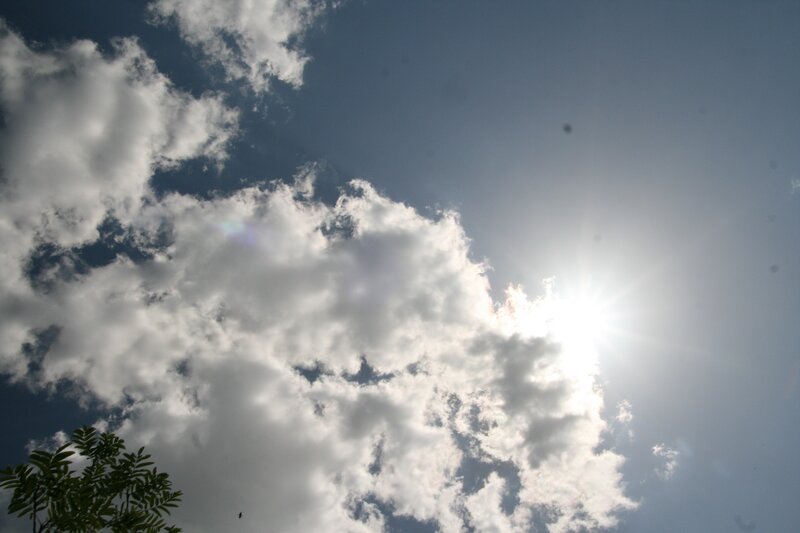 Sun shining through clouds