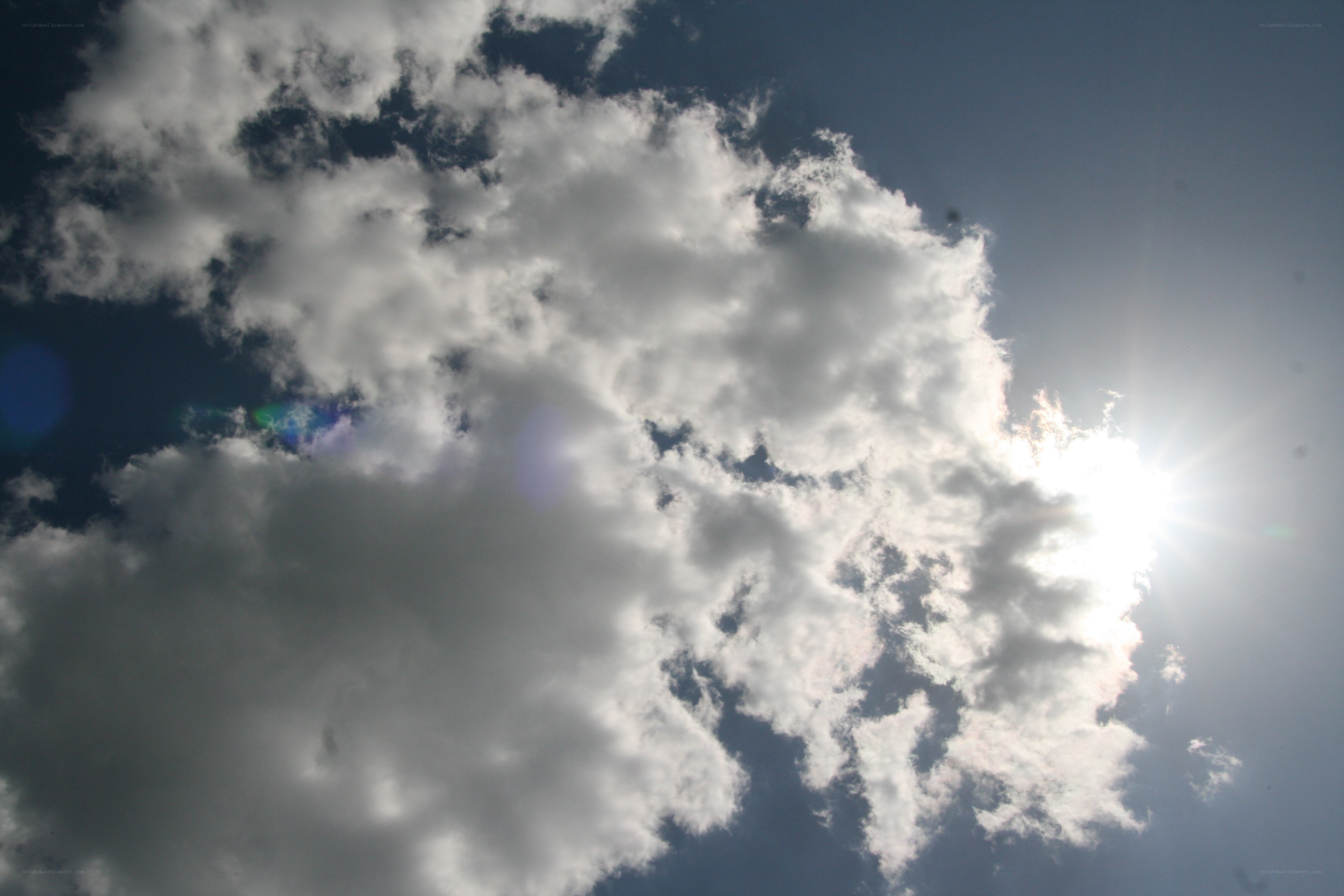 Sun shining through clouds