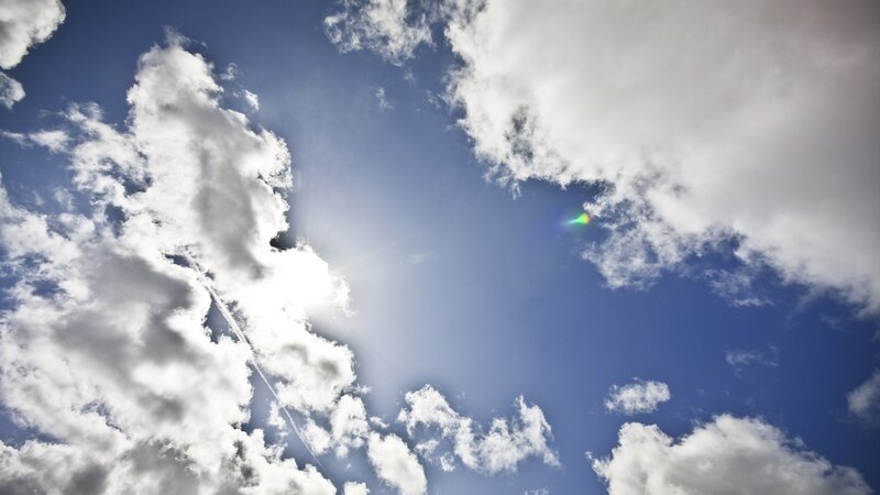 Sun shining through clouds