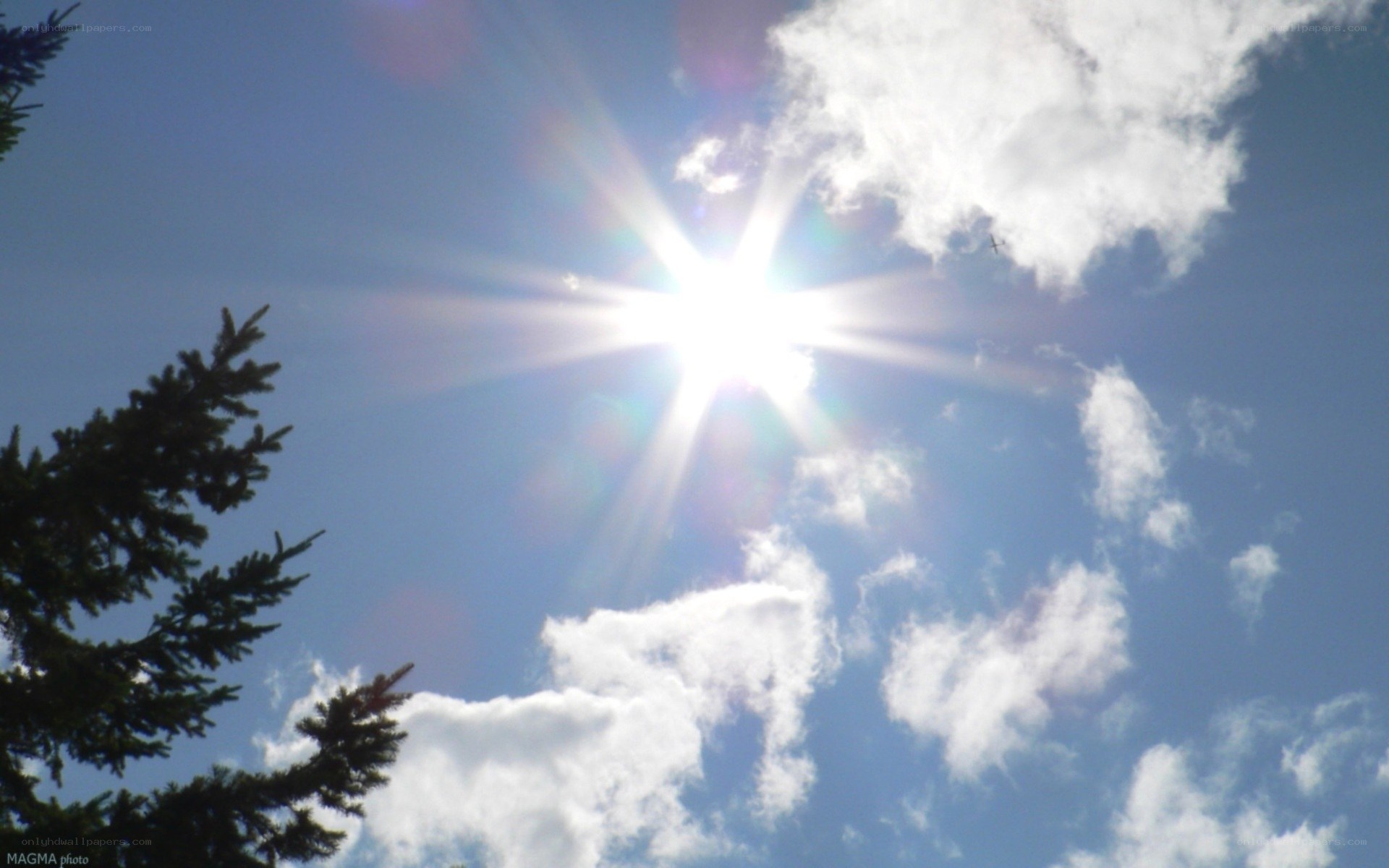 Sun shining through clouds
