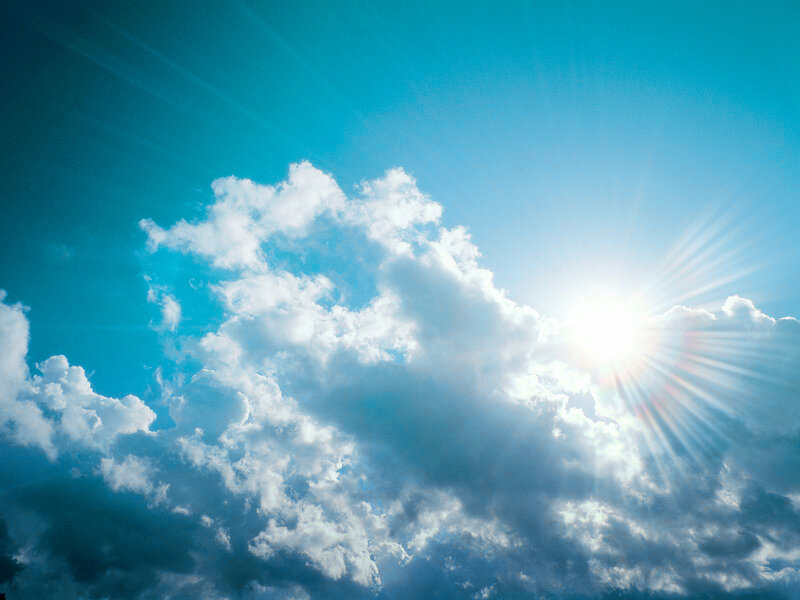 Sun shining through clouds