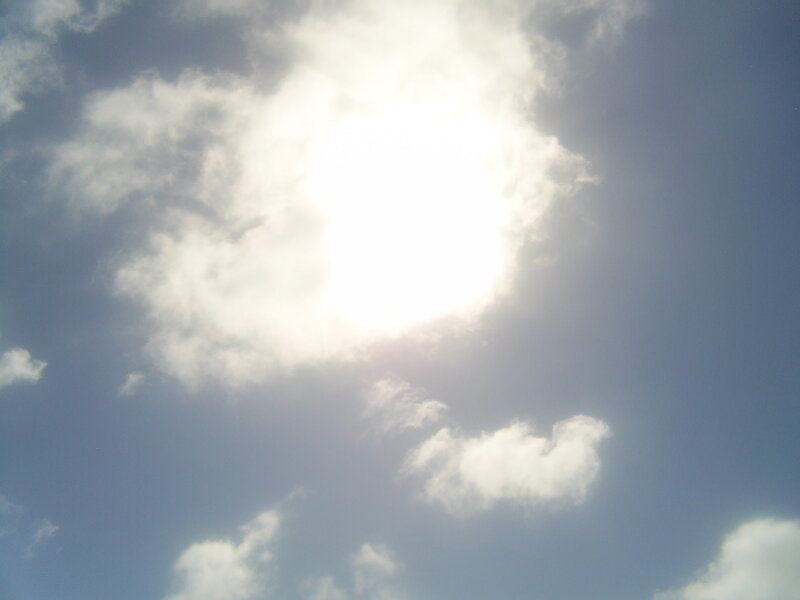 Sun shining through clouds