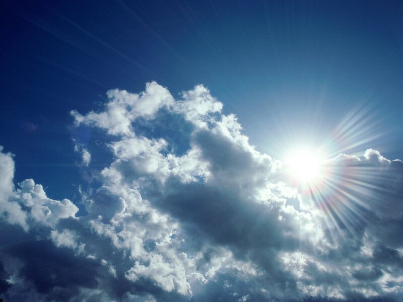 Sun shining through clouds