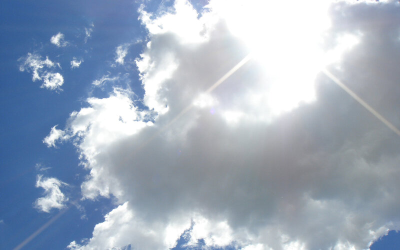 Sun shining through clouds